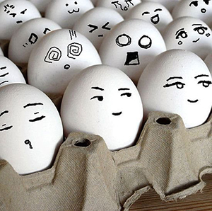 Eggs In Carton Faces